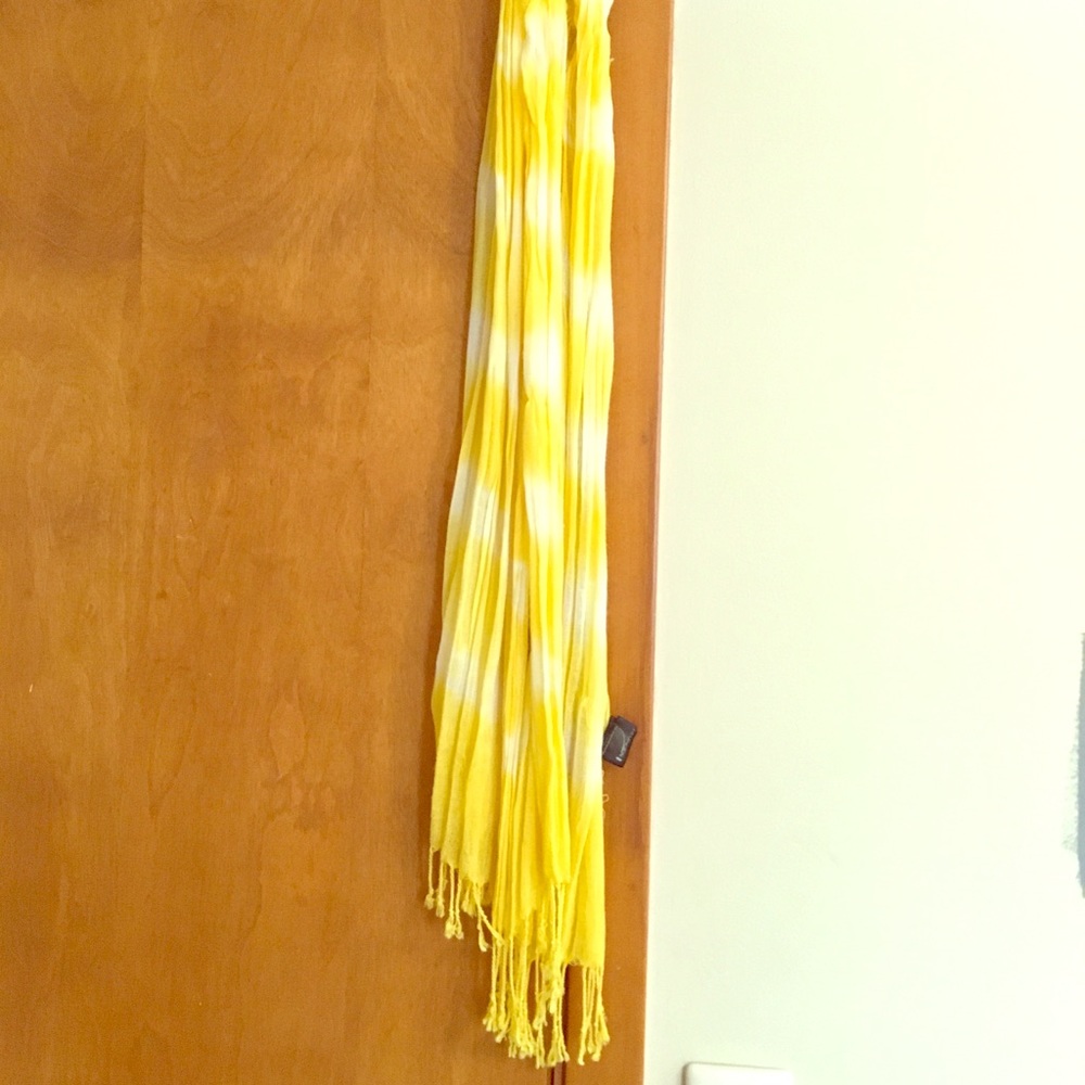 Yellow and white scarf with fringe